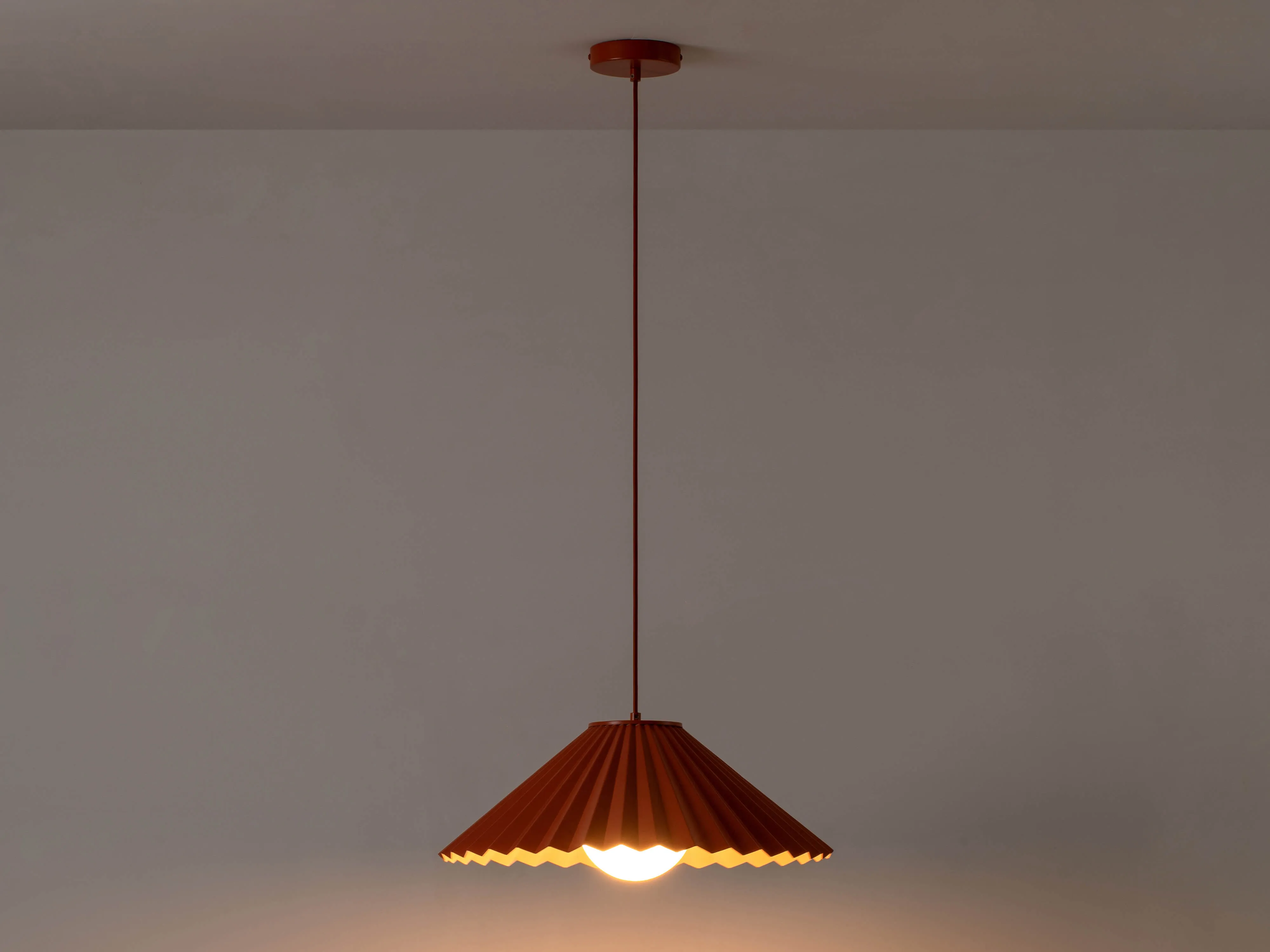 Burnt orange large pleat ceiling pendant